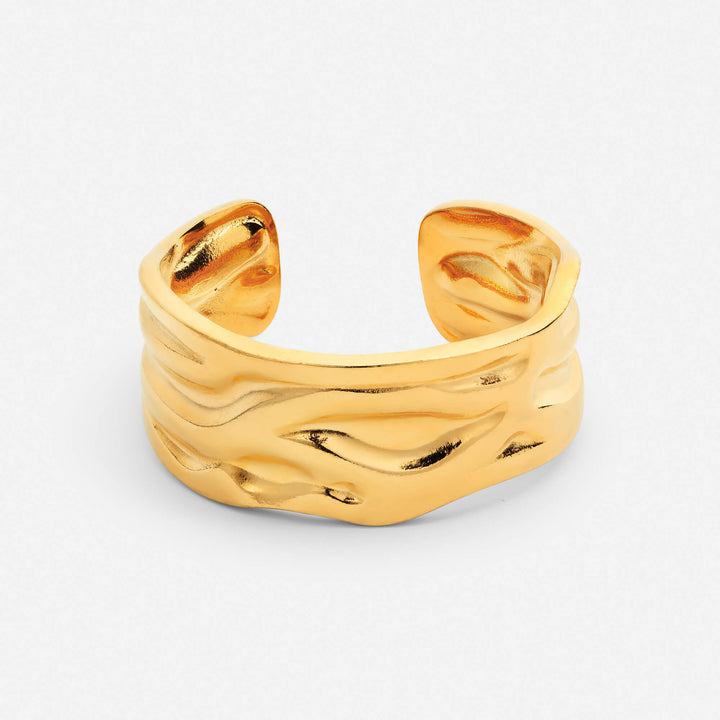 Anello con motivo a onde martellate